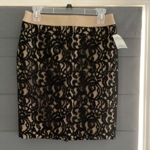 Donating to Goodwill 9/2!  Black Loft Lace Skirt with tan waist band and lining